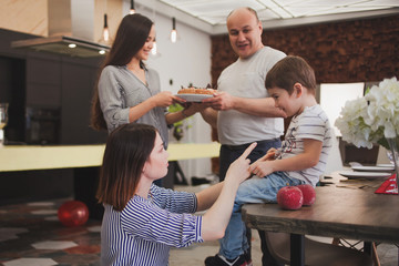 Family dinner. Family receives guests, a festive meeting