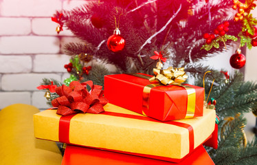 Christmas scene with tree gifts and colorful gifts box.