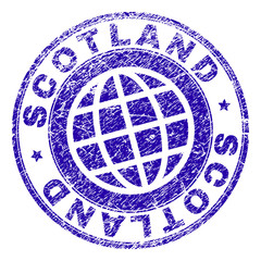 SCOTLAND stamp print with grunge texture. Blue vector rubber seal print of SCOTLAND title with retro texture. Seal has words placed by circle and globe symbol.