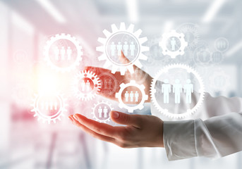 Cogwheels and gears mechanism as social communication concept