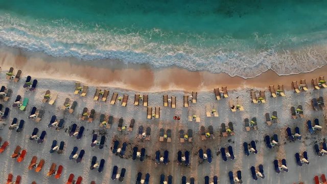 Sunrise at Marble Beach Thassos or Thasos Island Greece aerial video footage of tourists on the beach shot using a drone