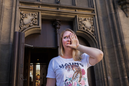 Girl near the German Church with protest poses