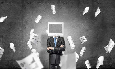 Businessman with monitor instead of head.
