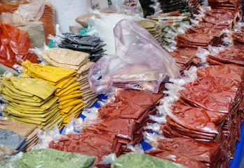 Turkish farmer market. Assortment of asian spices and herbs in package on the counter