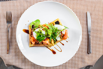 Salad with waffles salmon and green
