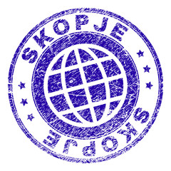 SKOPJE stamp imprint with grunge texture. Blue vector rubber seal print of SKOPJE tag with corroded texture. Seal has words arranged by circle and globe symbol.