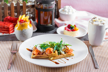 Salad with waffles salmon and green