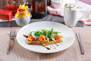 Salad with waffles salmon and green