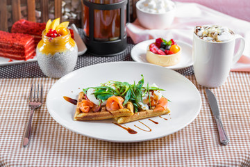 Salad with waffles salmon and green