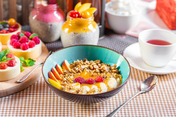 Porridge of muesli with fruit. Fresh fruit in porridge. Muesli with fruits. Muesli with fruit puree.