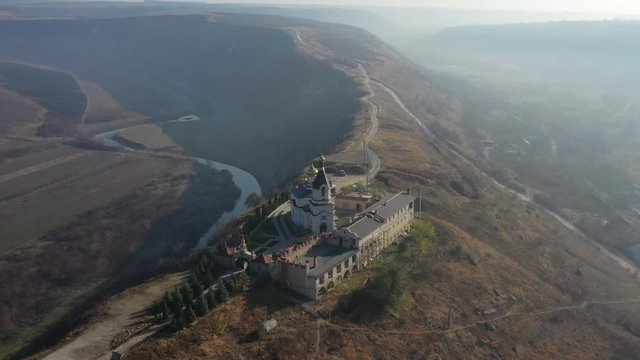 Republic of Moldova Old Orhei Monastery and Butuceni Village aerial view at sunrise