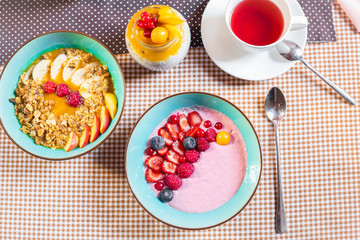 Porridge of muesli with fruit. Fresh fruit in porridge. Muesli with fruits. Muesli with fruit puree.