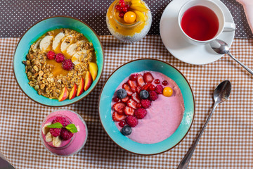 Porridge of muesli with fruit. Fresh fruit in porridge. Muesli with fruits. Muesli with fruit puree.