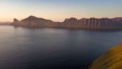 Aerial view of a sunset near the shores of Faroe Islands