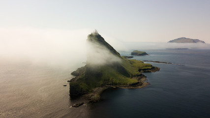 Aerial view of the beautiful Tindhólmur island in Faroe Islands