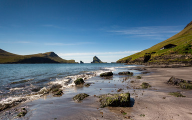 Spectacular view of the Tindhólmur island from the main land of Faroe Islands