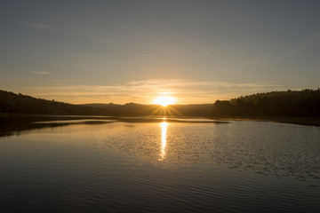 Sunset in the ruidera lagoons with the golden sky