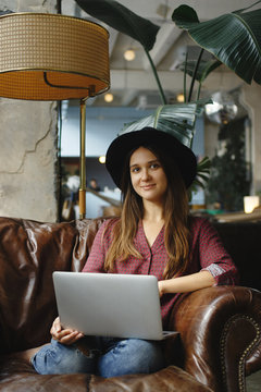 Young woman working with laptop