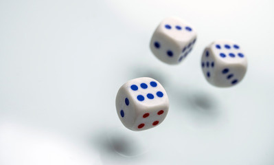 Three dice isolated on white background, conceptual image