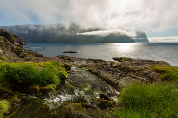 Beautiful shorelines in Faroe Islands filled with colourful algae
