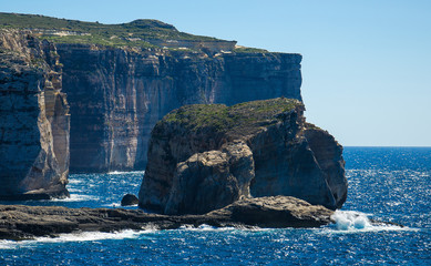 Fungus and Gebla Rock cliffs near Azure window, Gozo island, Malta