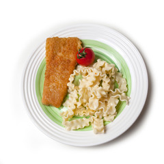 chop with pasta and tomato at round plate isolated