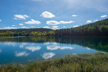 The ruidera lagoons on the route of Quixote with a blue sky