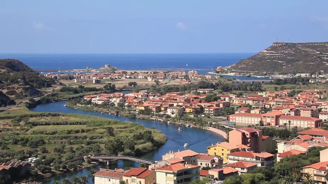 panoramic view colorful houses and red roofs of Bosa town in Sardinia