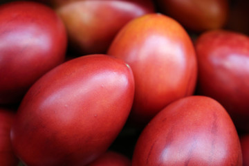 Fresh tamarillo fruits on a market. Tropical fruit also known as a tree tomato or dutch eggplant