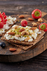 Sandwich with nuts and berrie Useful breakfast.