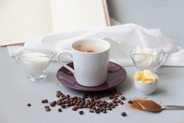 bulletproof coffee recipe keto. it works ketogenic diet. On the background an open book with copy space for text.
