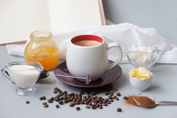 bulletproof coffee recipe keto. it works ketogenic diet. On the background an open book with copy...