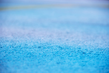 Horizontal texture of blue small stones and copyspace