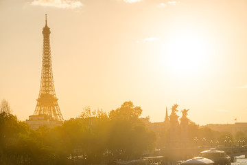 Beautiful sunset with Eiffel Tower and Seine river in Paris, France