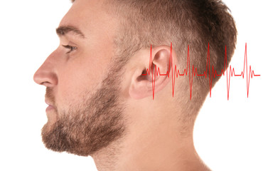 Obraz premium Young man on white background, closeup. Hearing problem