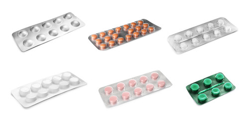 Set with pills on white background. First aid