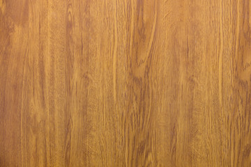 Close-up of natural new soft yellow golden brown wooden surface, parquet, planks or boards....