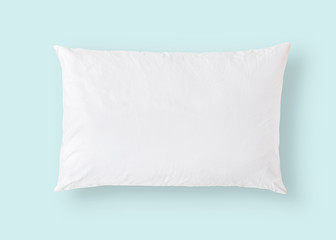 White pillow on blue background isolated with clipping path for bedding mockup design template