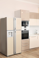 Fototapeta premium Interior of spacious modern kitchen with refrigerator