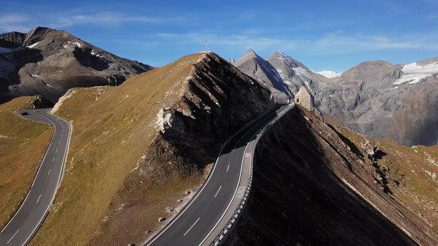 Flight around of Fuscher Torl pass on Grossglockner scenic High Alpine Road, Austria