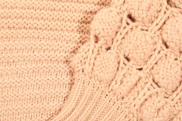 Fototapeta na wymiar Texture of cozy warm sweater as background, closeup