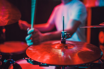 Professional drum set closeup. Drummer with drums, live music concert.
