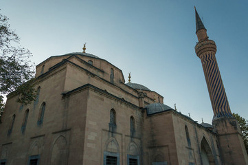 Fototapeta na wymiar Historic mosque photographed from lower angle (Mısri camii) Afyon, Turkey