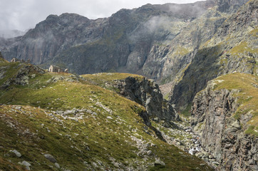 Fototapeta premium Mountain river canyon near Cascata delle Pisse waterfall in valley of Pisse, Alagna Valsesia area, Italy