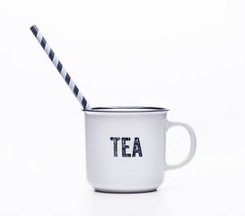 Classic white tea mug, a cup with black edging and an inscription on a white background.