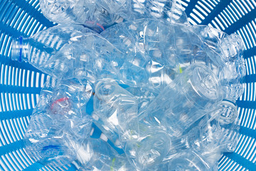 Plastic bottles in waste basket.