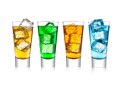 Glasses of energy carbonated soda drink with ice