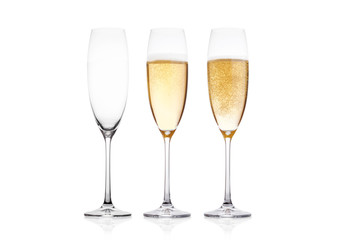 Elegant glasses of yellow champagne with bubbles