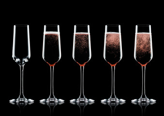 Rose pink champagne glasses with bubbles