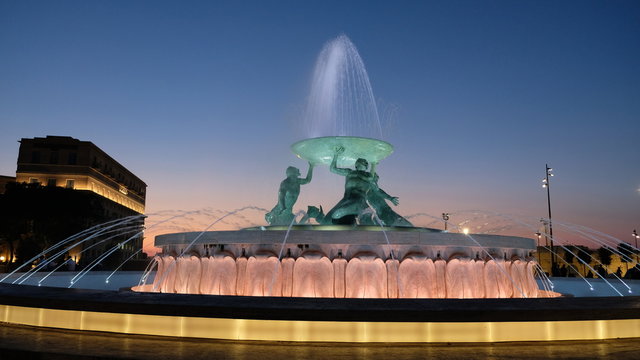 Valleta, capital city of Malta. View of the Triton Fountain, at the entrance of the city. Was designed and constructed between 1952 and 1959 and it&acute;s one of Malta&acute;s most iconic Modernist landmarks